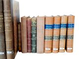 a lot of books that are sitting on a shelf