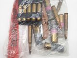 a close up of a bunch of bullet shells in a plastic bag