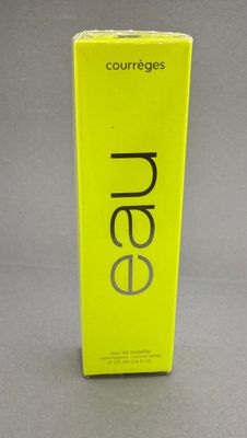 a close up of a box of perfume on a table