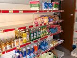 a store shelf with various items on it in a store