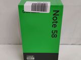 a green box with a barcode on the side of it