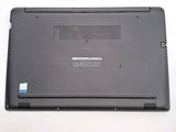 a laptop that is sitting on a white surface
