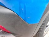 a close up of a blue car ' s rear end
