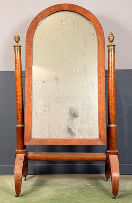 an image of a mirror sitting on top of a wooden stand