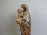 statue of a woman holding a child in her arms