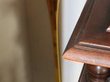 a wooden table with a clock on top of it