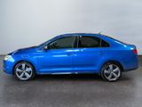 a picture of a blue car parked in a garage