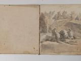 an old book with a picture of a mountain and trees on it