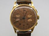 an image of a gold wrist watch with brown leather strap