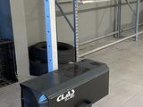 une photo d'un support pour appareils de musculation dans un garage