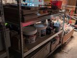 a shelf with many items on it in a room