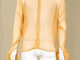 mannequin dressed mannequin wearing a yellow shirt and white pants