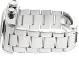 a silver watch that is sitting on a white surface