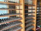 a lot of small toy soldiers on display in a case