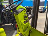 a close up view of a forklift in a parking lot