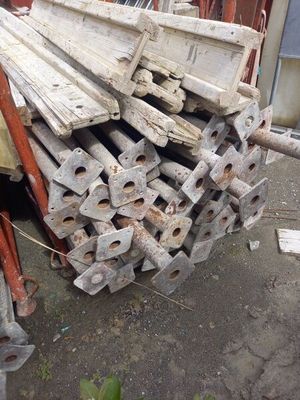 many pieces of wood stacked on top of each other