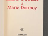 a white book with red lettering on it