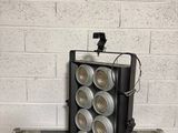 an image of a black case with a bunch of cans on top of it