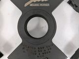 two circular cutters that are on a white surface