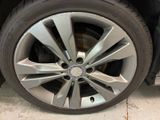 a close up of a tire on a car ' s rim