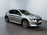the silver car is parked in a white room with a black floor