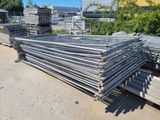 a lot of steel bars stacked on top of each other