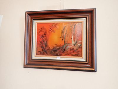 une photo d'un tableau accroché au mur