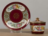 a plate and a bowl sitting on a table
