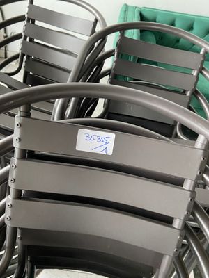 a lot of chairs that are sitting in a room