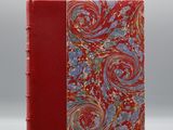 un livre rouge avec une couverture rouge et un motif floral