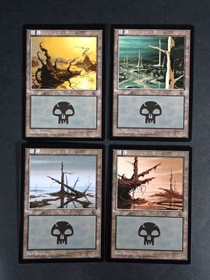 four framed pictures of elephants and a boat on the water