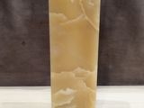 a picture of a candle that is sitting on a table