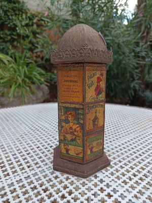 a small wooden box sitting on a table in the garden