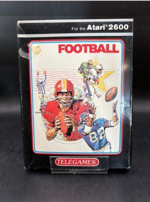 a close up of a box with a football game on it