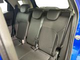a close up of a car ' s seats in the back of the car