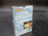 a box of pokemon cards sitting on a table