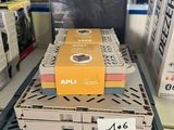 several boxes of pizza sitting on top of a shelf in a store
