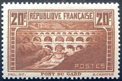 a stamp with a picture of a bridge on it