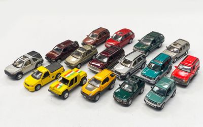 a lot of toy cars that are lined up together