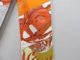 a neck tie with a picture of a tiger on it