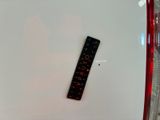 a close up of a ruler on a white surface