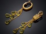 a pair of gold and green quartz earrings