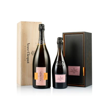 two bottles of champagne in a wooden box