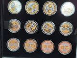 a picture of a display case with a variety of coins