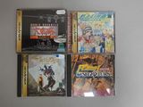 quatre CD posés sur une table