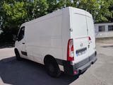 a white van that is parked in the parking lot