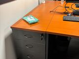 an image of a desk with a computer monitor and keyboard
