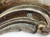 a close up of a metal object with a number on it