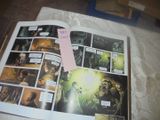 a picture of a comic book open on a bed