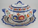 an image of a tureeny dish with a lid